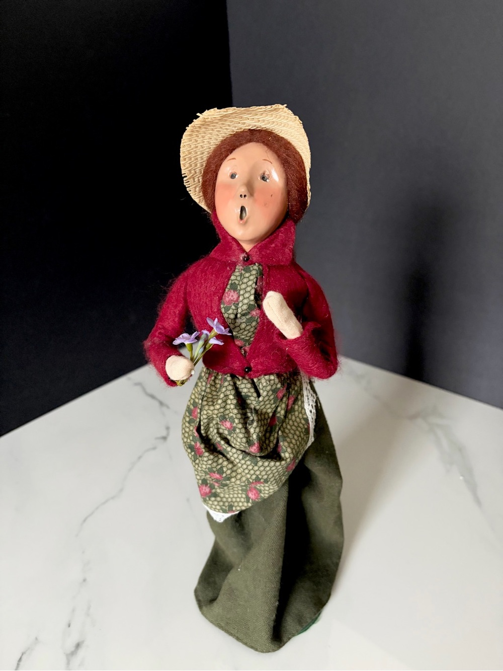Caroler with Red Hair and Violet Flowers by Byers' Choice